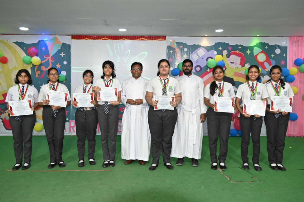 Students receiving recognition during an event